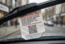 车窗上贴着“罚单扫码缴费”：假罚单二维码 quishing 盗刷识别-美国通